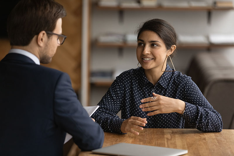 Confident,Young,Indian,Woman,Have,Recruitment,Talk,With,Male,Employer